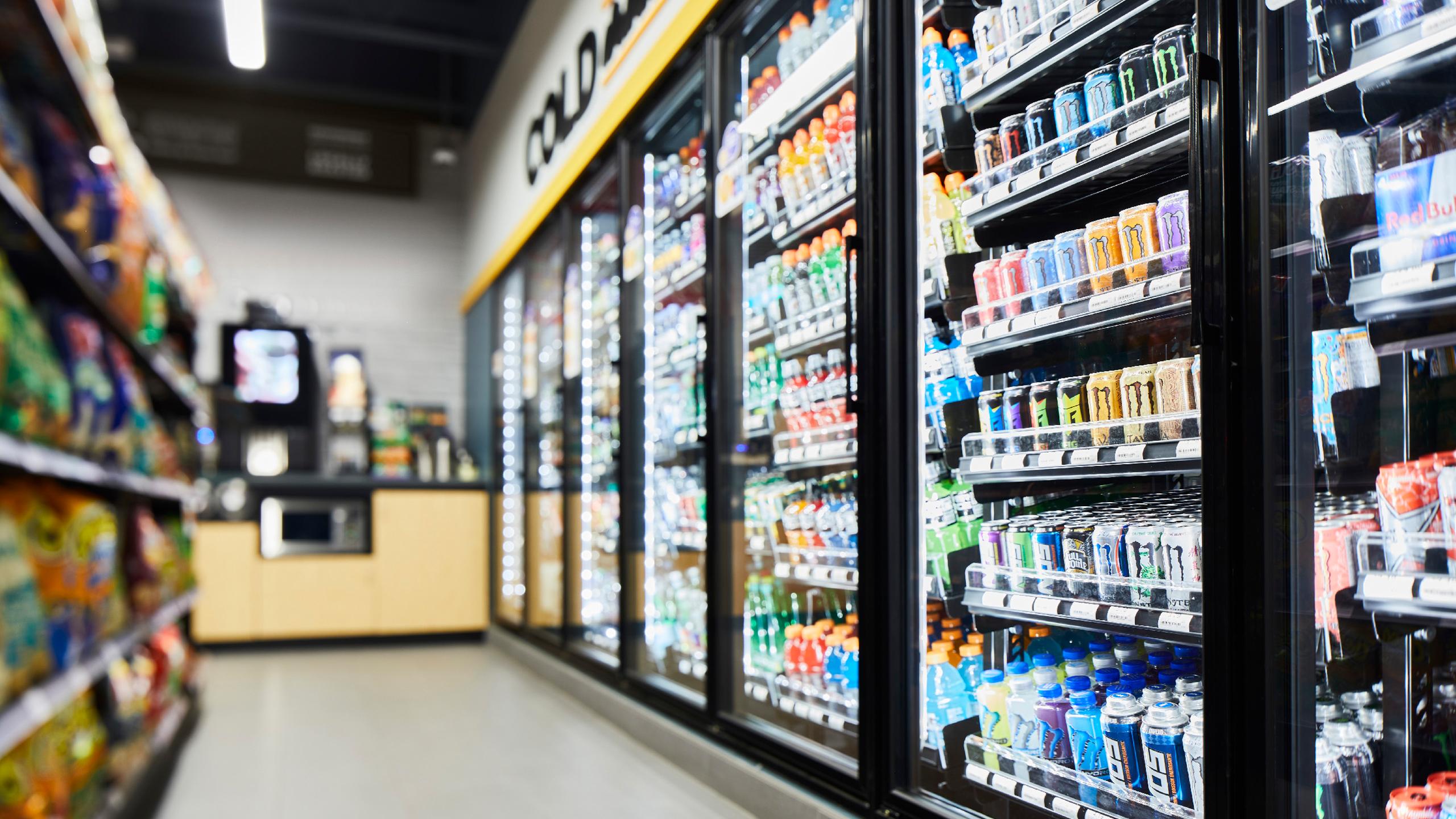 Convenience store showing beverage cooler.