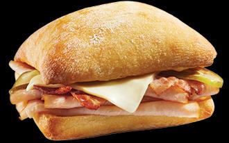 Sliced turkey, bacon and Swiss cheese finished with roasted garlic aioli and honey mustard sauce.