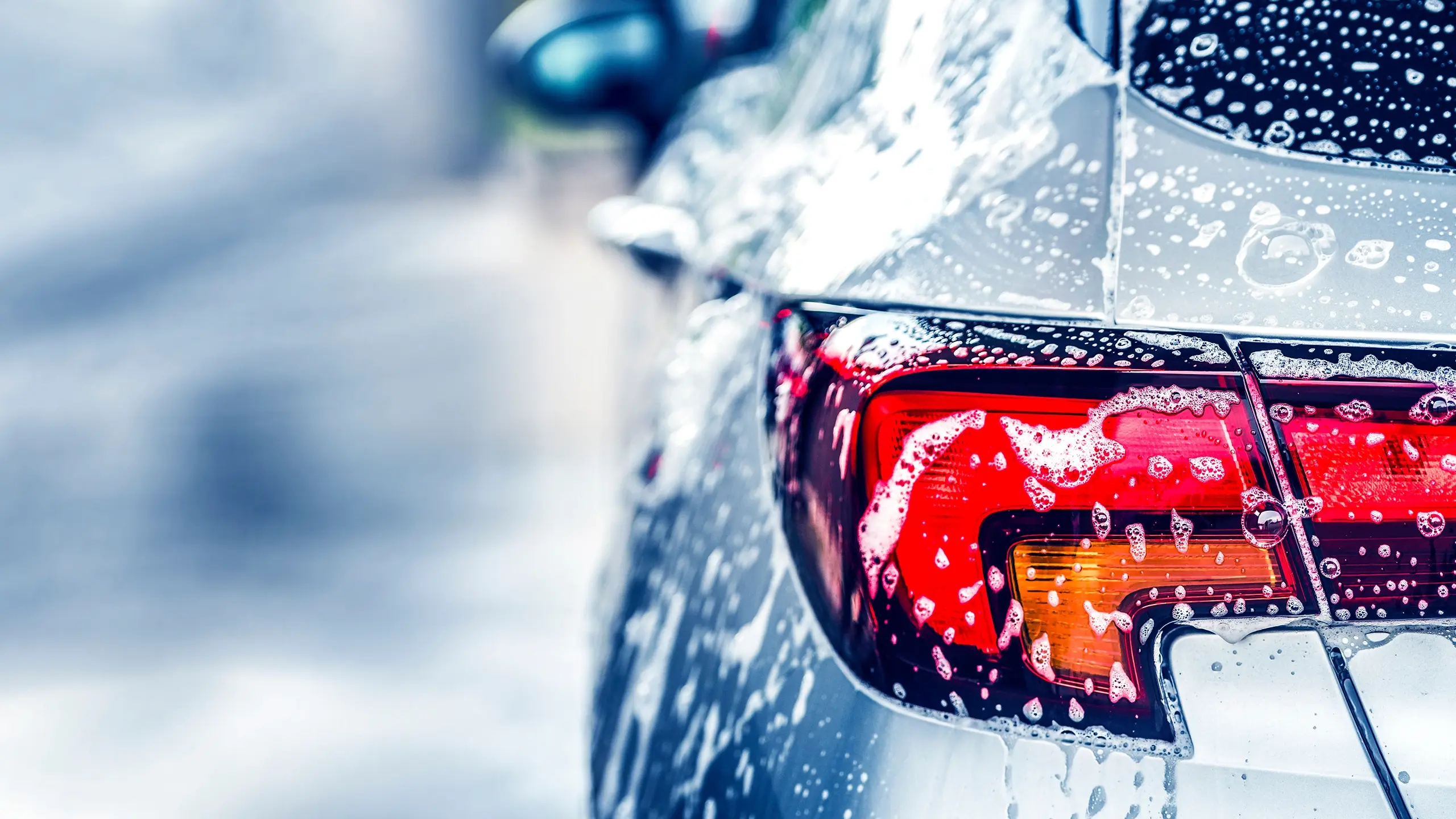 Back of a vehicle in a carwash.